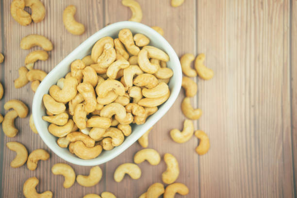 istock Roasted cashew nuts in bowl 1456711896
