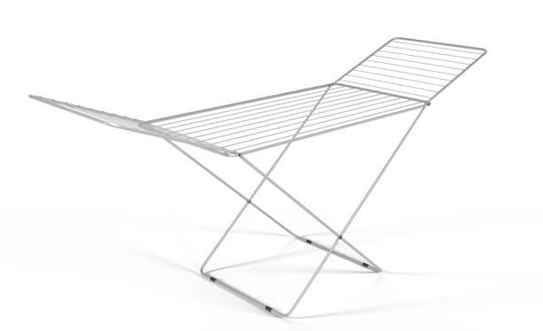 istock Laundry drying rack isolated on white background 3d render icon. Realistic mockup of folding floor dry equipment for wet clean clothes, empty silver metal or plastic hanger angle view 1456716749