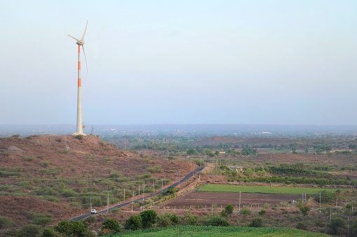 A windmill and landscape