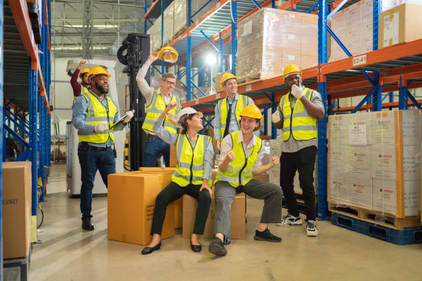 istock Teamwork group of multi ethnic workers working in large warehouse retail store industry factory. Stock storage. Cargo in ecommerce and logistic concept. Depot. People lifestyle. Shipment service. 1456720408