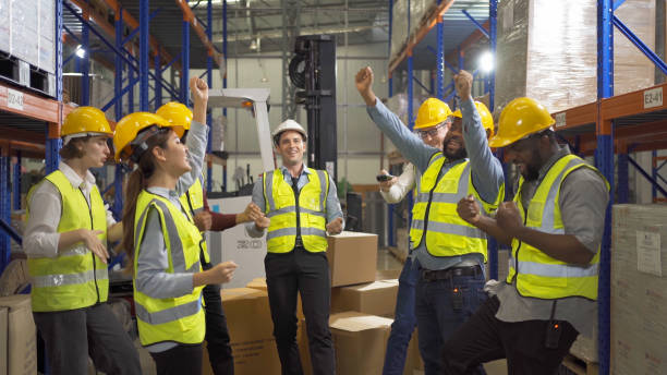 istock Teamwork group of multi ethnic workers working in large warehouse retail store industry factory. Stock storage. Cargo in ecommerce and logistic concept. Depot. People lifestyle. Shipment service. 1456720459