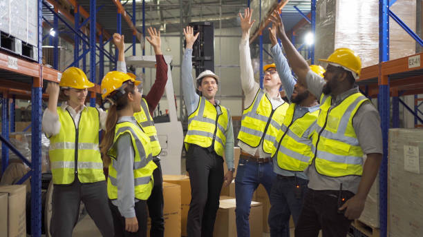 istock Teamwork group of multi ethnic workers working in large warehouse retail store industry factory. Stock storage. Cargo in ecommerce and logistic concept. Depot. People lifestyle. Shipment service. 1456720465