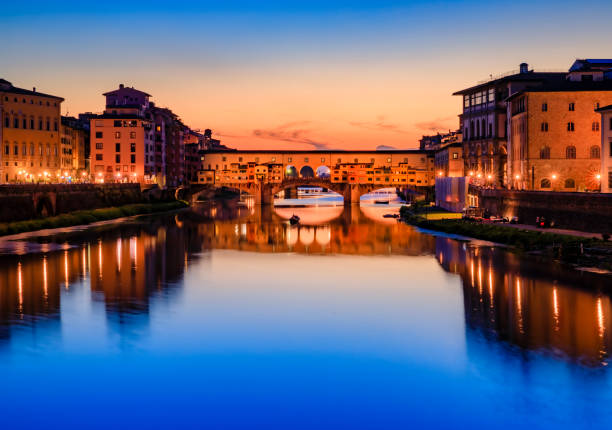 istock Famous Ponte Vecchio bridge on the river Arno River at sunset, Florence, Italy 1456722536