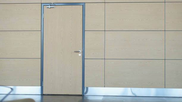 istock Light beige brown door to match wall. closeup 1456725664