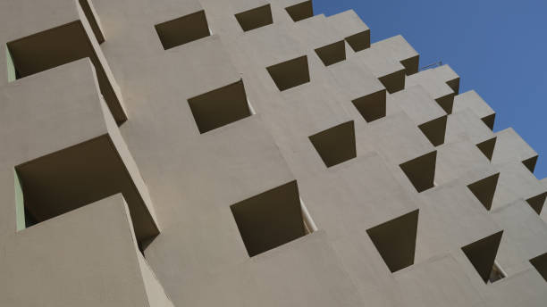 istock Building profile with concrete beams against sky 1456725674