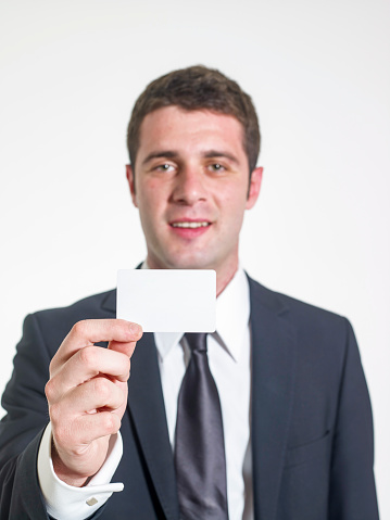 Young businessman showed his business card