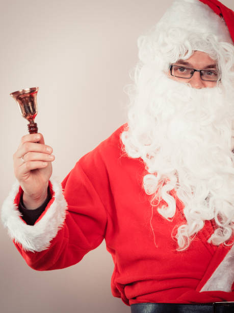 istock Christmas Santa Claus with bell 1456729143