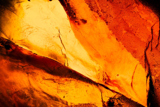 macro abstrait ambre - amber photos et images de collection