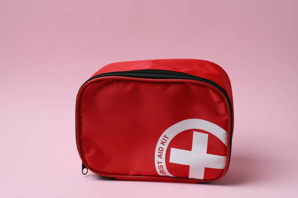 istock First aid medical kit on pink background 1456731955