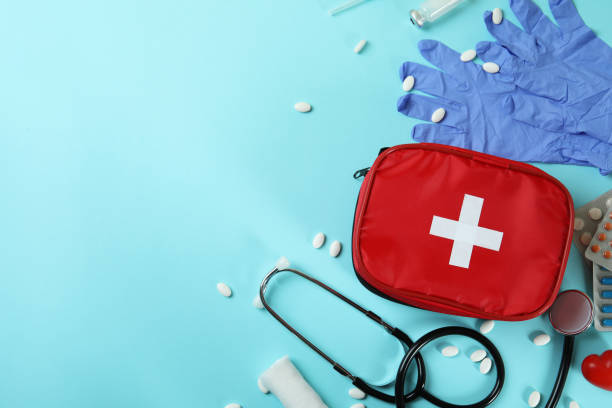 istock First aid medical kit on blue background 1456732243
