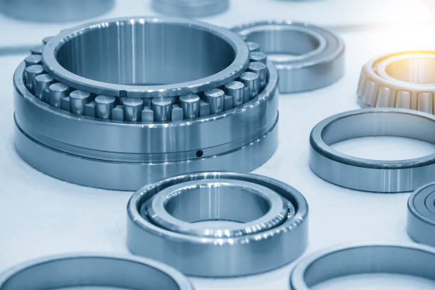 istock The cylindrical rolling bearing parts in light blue scene. 1456734384