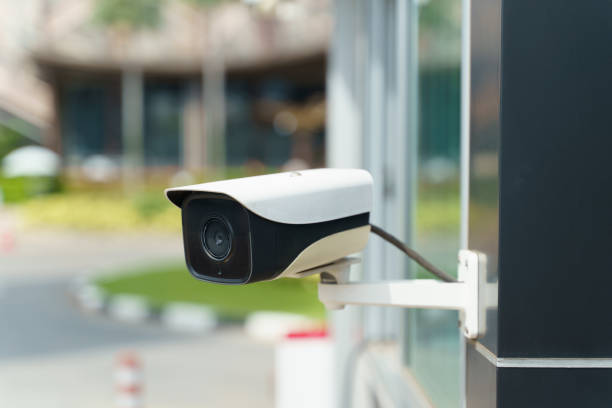istock Outdoor CCTV camera, circuit camera security system on the wall building. 1456737058