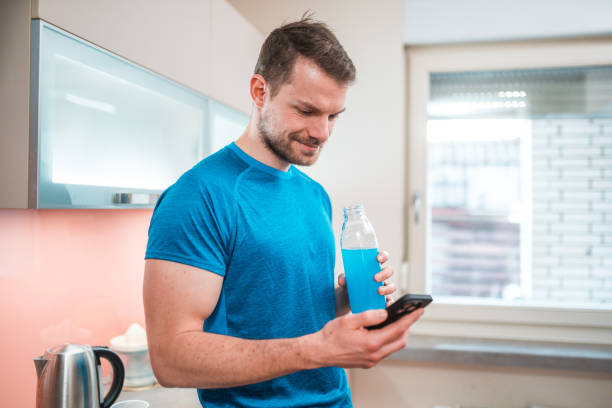 istock Mid Adult White Male Drinking An Energetic Drink After A Workout 1456741123