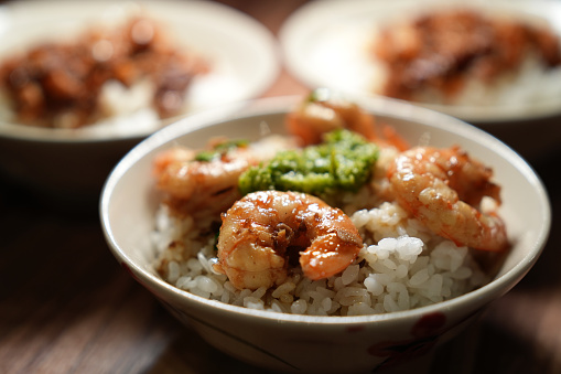 Taiwan famous traditional street food, soy stewed prawn on cooked rice