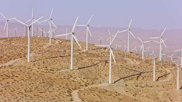 AERIAL Windmills turning on a hill in Palm Springs, California