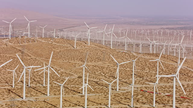 AERIAL Windmill farm in a desert in Palm Springs, California
