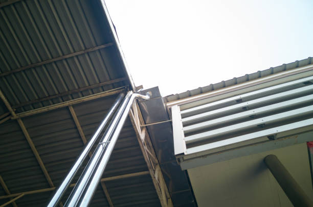 istock Stainless steel rain gutter on the side of the building. 1456749718
