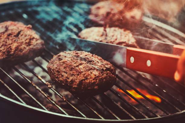 istock Tasty vegan burger preparation 1456751739