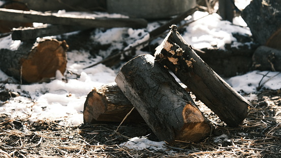Abstract view of firewood on the snow