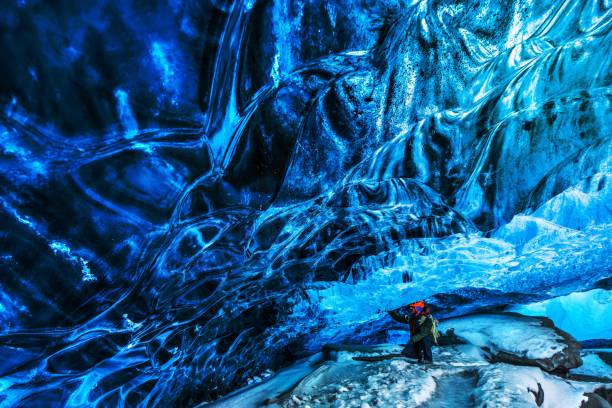 istock Traveler in the ice cave 1456756796
