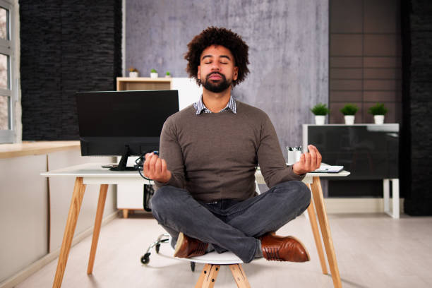 istock African American Male Meditation In Office 1456757906