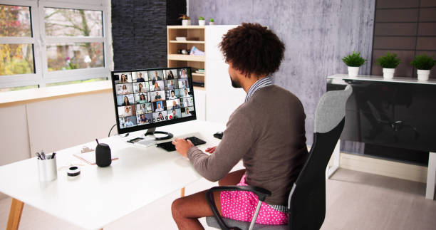 istock Man Business Video Call In Shorts 1456758544