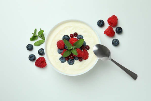 istock Concept of tasty breakfast with yogurt on white background 1456758936
