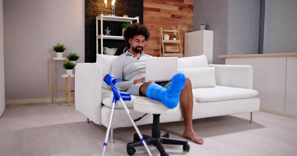 istock Injured Man With Broken Leg 1456759305