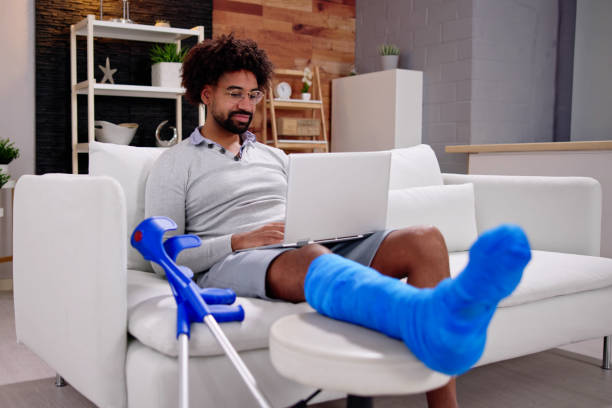 istock Injured Man With Broken Leg 1456759310