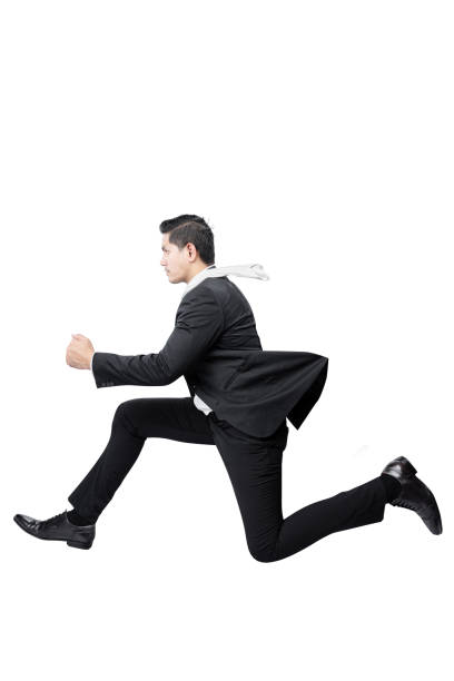 istock Asian businessmen running 1456759876