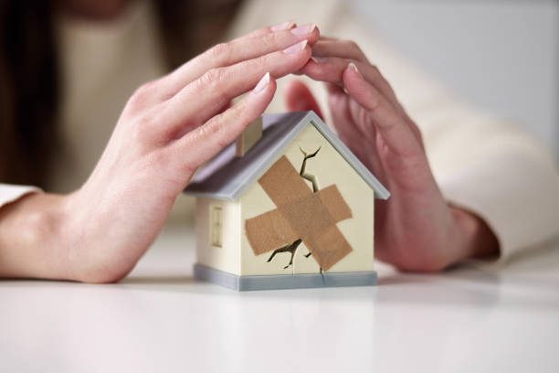 istock Businesswoman Protecting Broken 1456761157