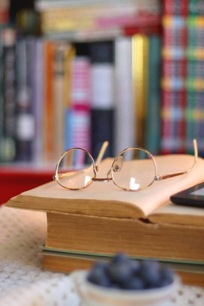 istock Tea, Books, Tablet, Cookies and Candles 1456762121