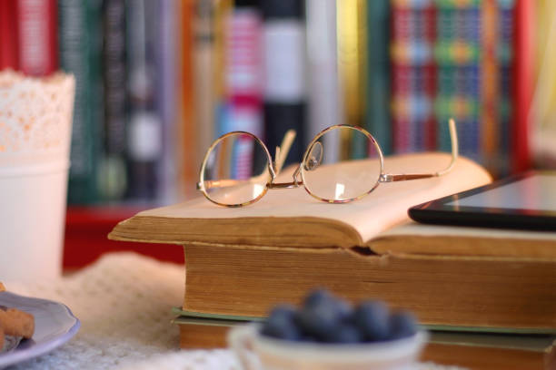 istock Tea, Books, Tablet, Cookies and Candles 1456762123
