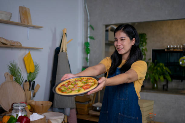 istock Entrepreneur made pizza for sale. Small business. 1456762126