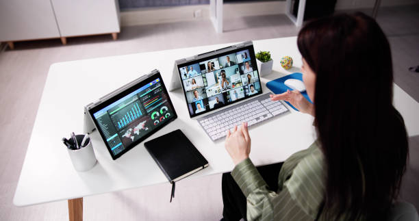 istock Watching Online Video Conference Meeting 1456763048