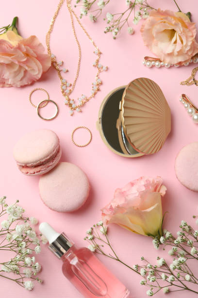 istock Female accessories and macaroons on pink background 1456763237