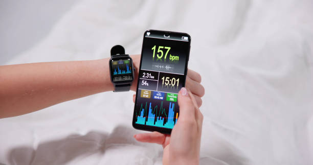 istock Woman's Hand Showing Heart Rate On Smart Watch 1456763432