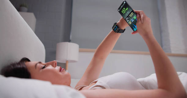 istock Woman's Hand Showing Heart Rate On Smart Watch 1456763440