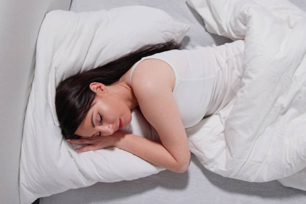 istock Women Sleeping On Pillow In Bed 1456763464