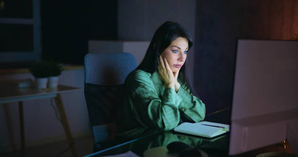 istock Frustrated Bored Female At Desk 1456763829