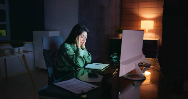 istock Frustrated Bored Female At Desk 1456763860