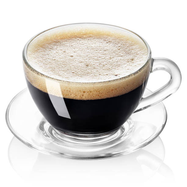 istock espresso in transparent glass cup with saucer isolated on white 1456765327