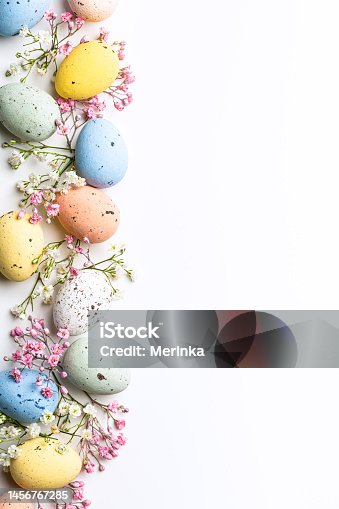 istock Easter composition of Easter quail eggs and flowers 1456767285