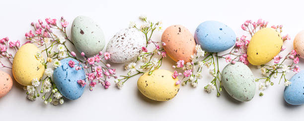 istock Easter composition of Easter quail eggs and flowers 1456767288
