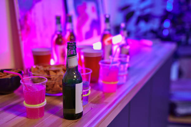 istock Group of drinks in bottles and cups on small table served with snack 1456768702