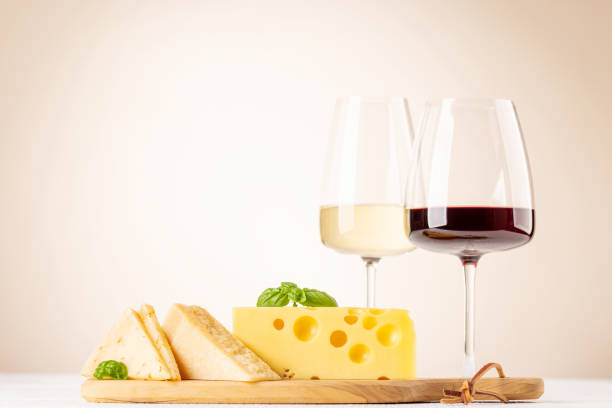 various cheese on board and wine - cheese emmental cheese swiss culture cutting board imagens e fotografias de stock