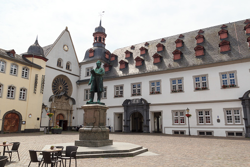 Koblenz, Germany - June 27, 2021: Johannes Müller monument statue on Jesuit Square in front of the town hall of Koblenz