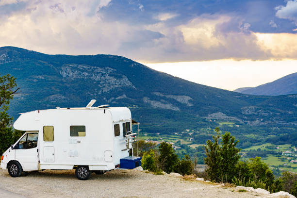 Rv camper in mountains, Verdon Gorge France. Caravan rv on nature. Verdon Gorge France. Motor home camping car driving through mountain landscape. Adventure with camper vehicle.. RV truck stock pictures, royalty-free photos & images