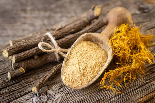 istock Licorice root, licorice fiber and powder in shovel on rustic background ( glycyrrhiza glabra ) 1456775146
