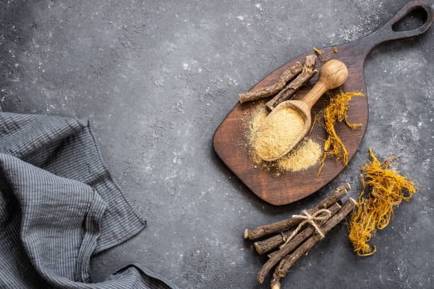 istock Licorice root, licorice fiber and powder in shovel on rustic background ( glycyrrhiza glabra ) 1456775594